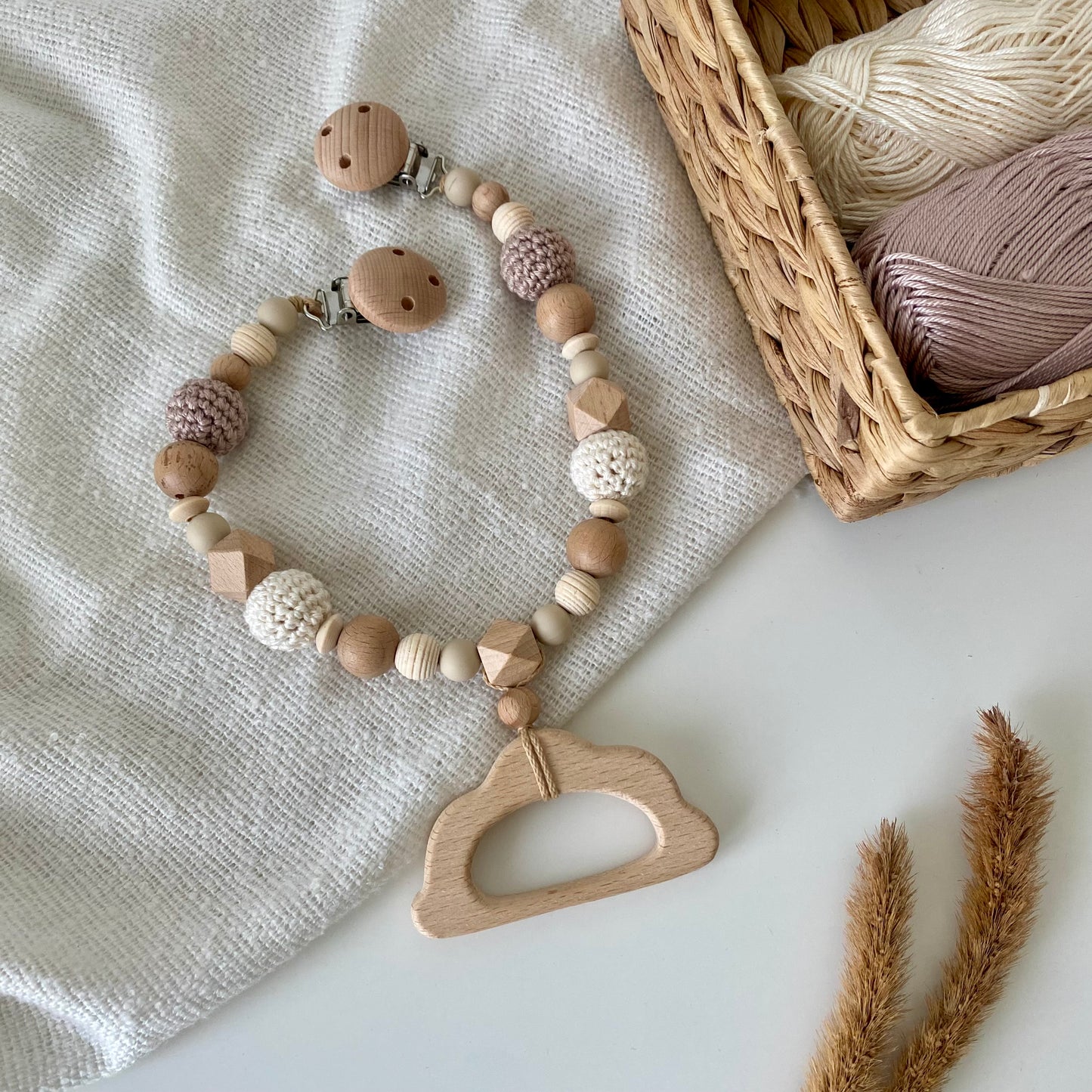 Kinderwagenkette Holzwolke weiss/beige